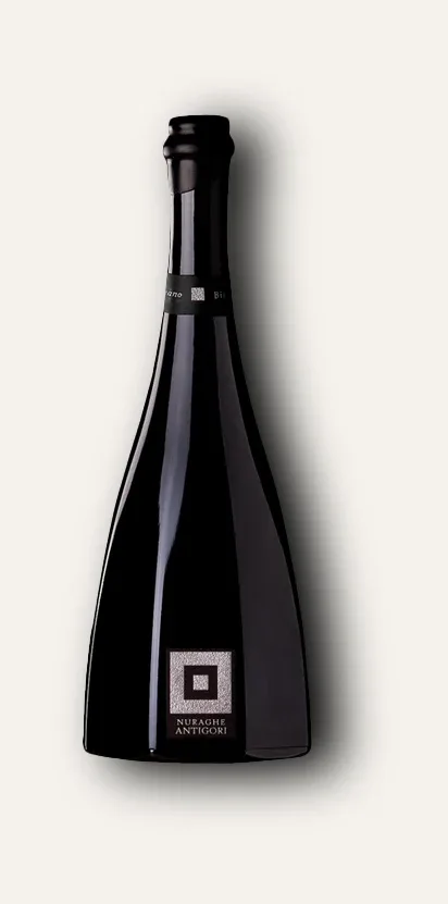 The octagonal Carignano bottle, twin to the Bovale: only the square and the winery name remain on the glass
